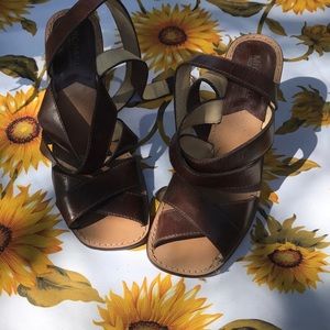 Sunny Delights. Michael Kors brown with brass decorative detail on heel